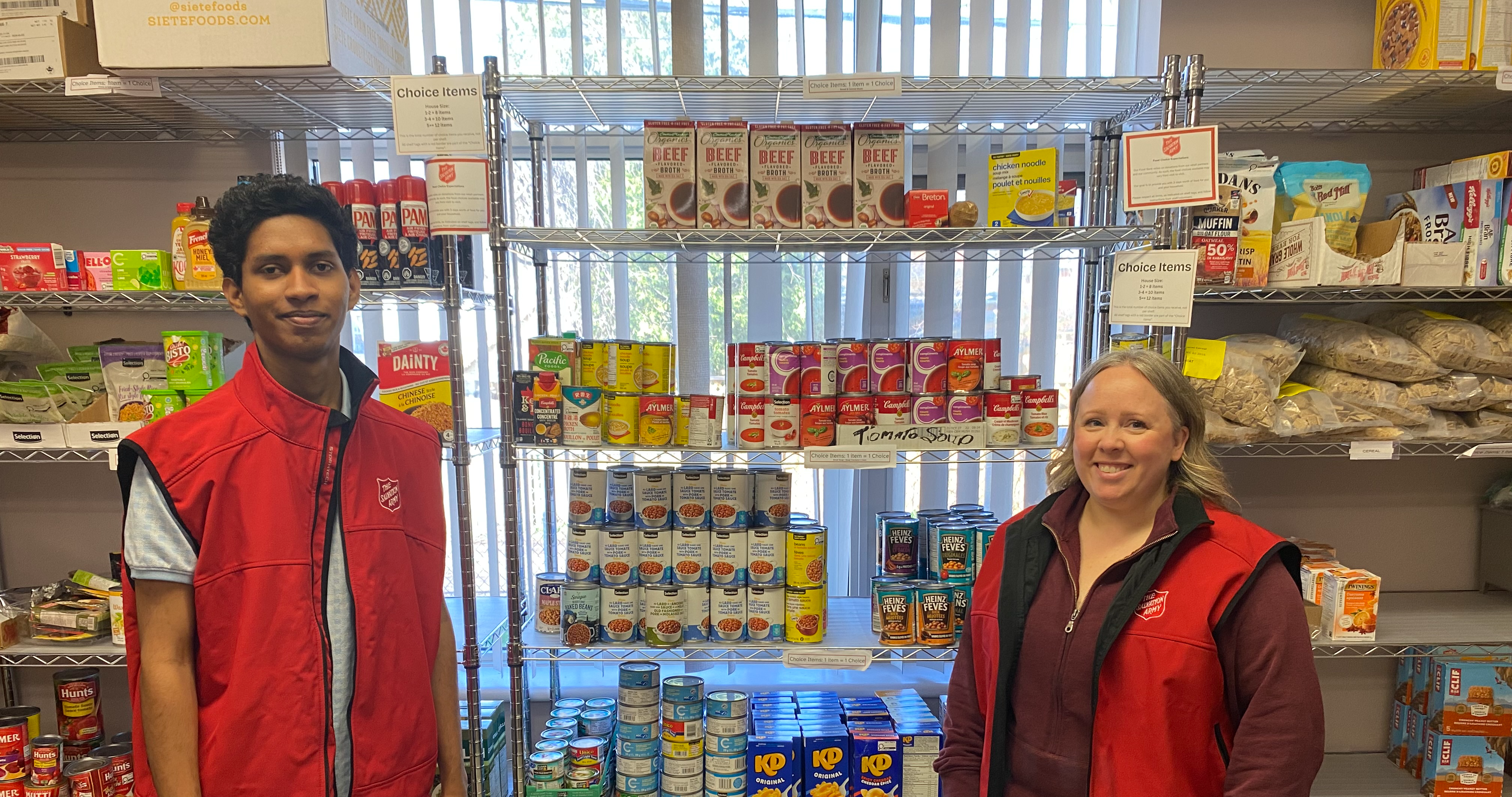 Food bank staff smiling