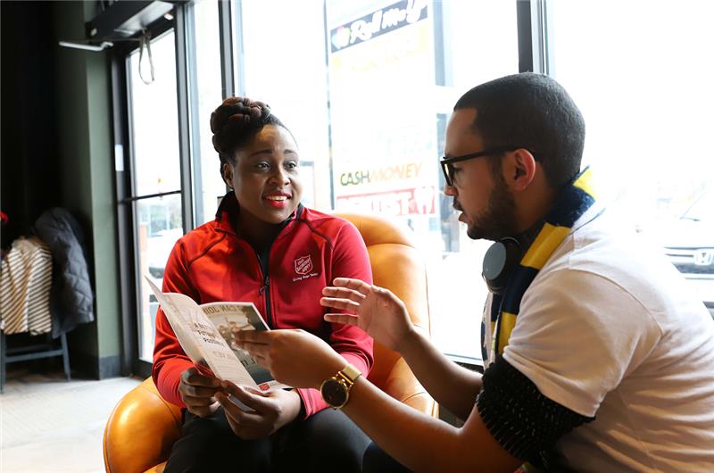 A client being briefed on the programs being offered